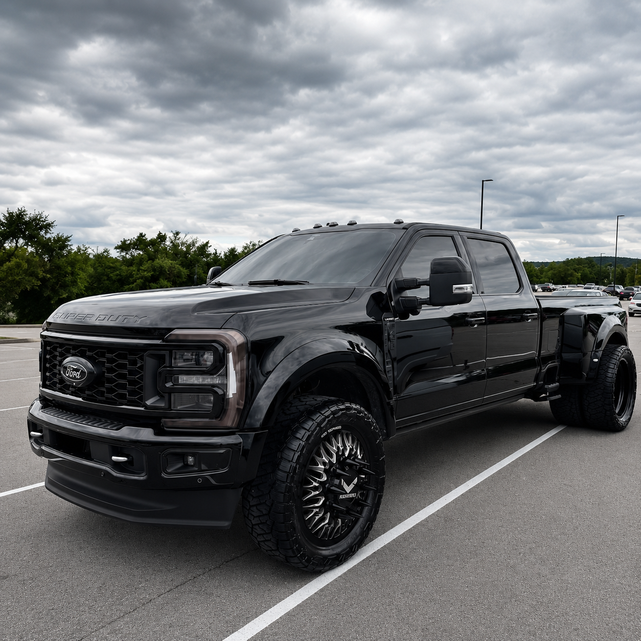 Glossy black Ford Super Duty dually with a flawless exterior finish